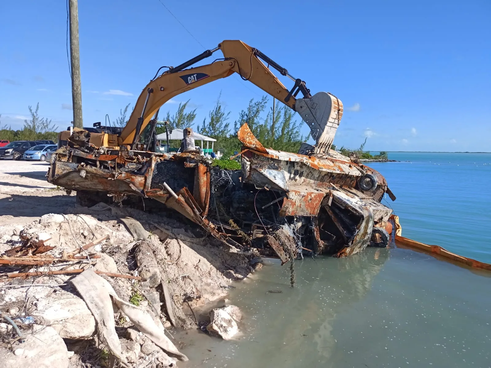 Coastal recovery work with an excavator